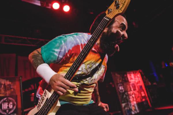 Bassist Ian Grushka pokes his tongue out at New Found Glory's Metro audience.