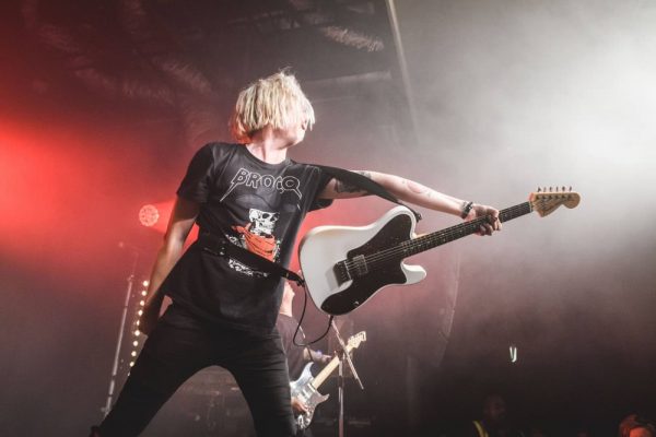 With Confidence guitarist Luke Rockets holds his guitar out over the crowd at the Factory Theatre