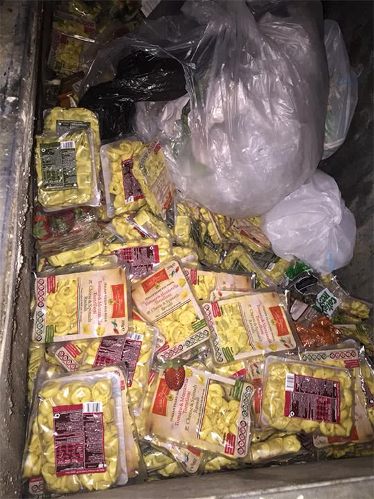Images of excessive food left behind in Aldi bins