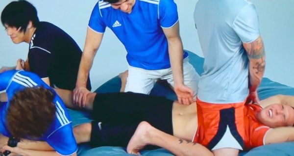 a scene from one of the competitive tickling videos